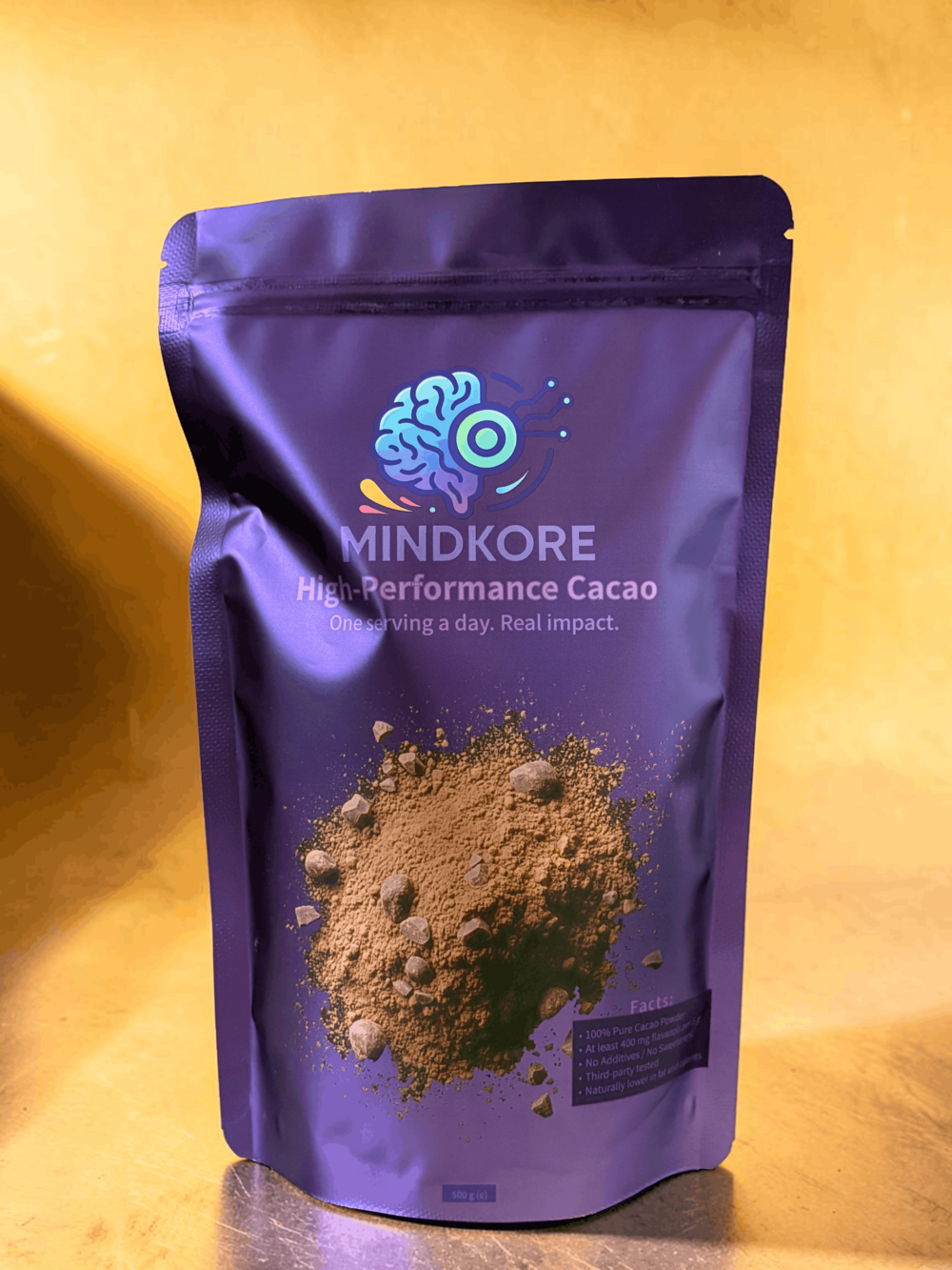 High Flavanol Cacao Powder [APEX] pack, 500 grams of cacao showing the front with a sleek background